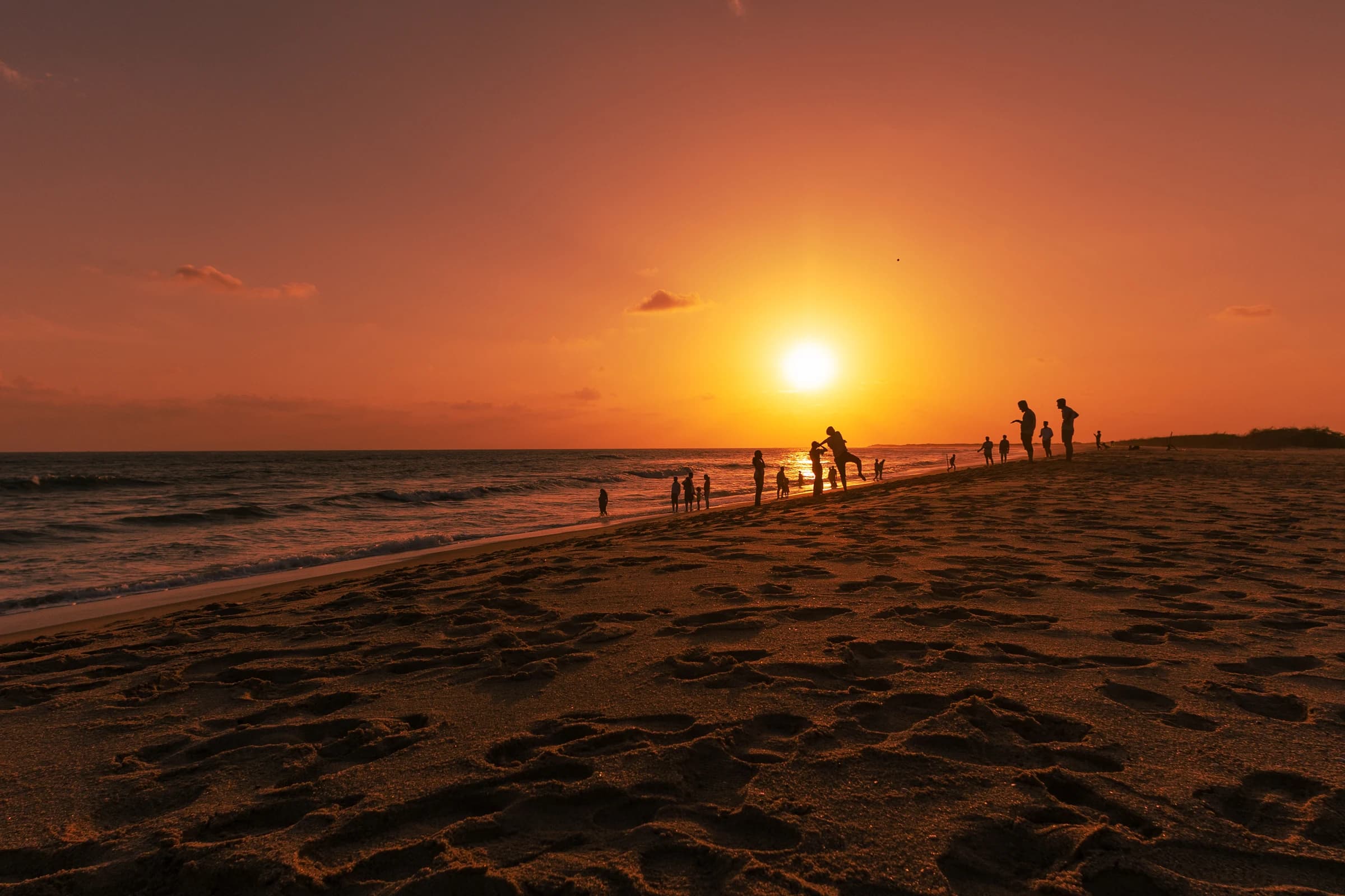 Mandvi Beach orange sunset silhouettes at the Arabian Sea coast