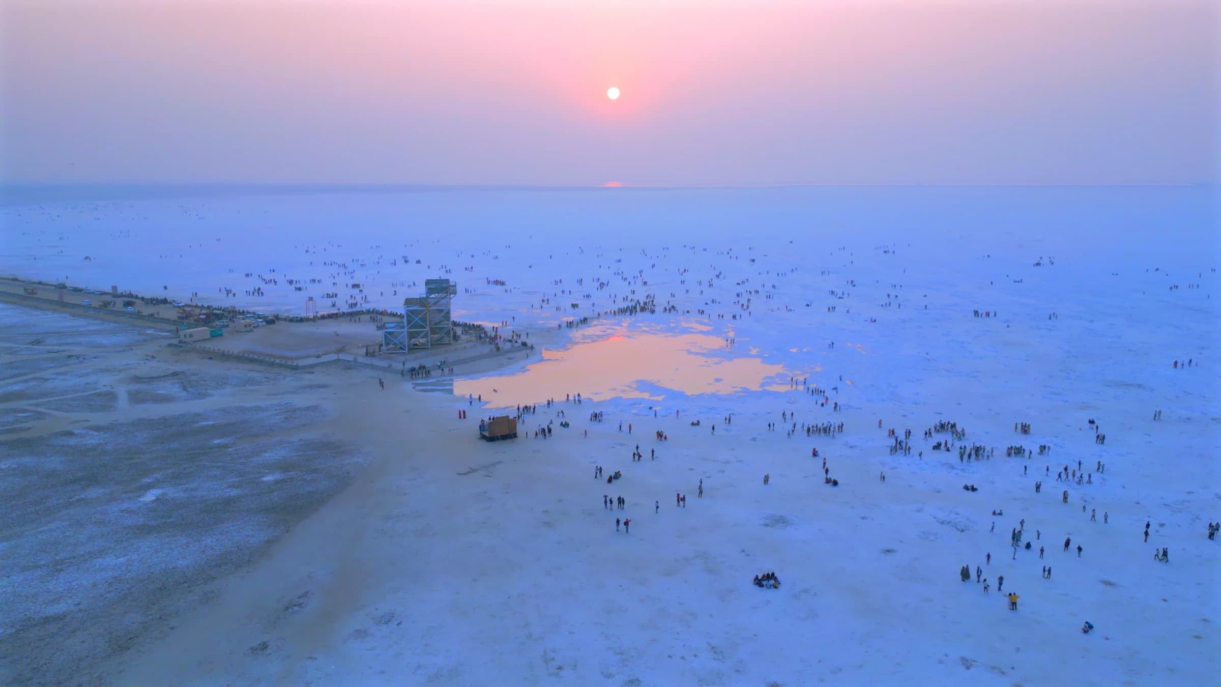 White Rann aerial sunset with festival crowds at Rann Utsav