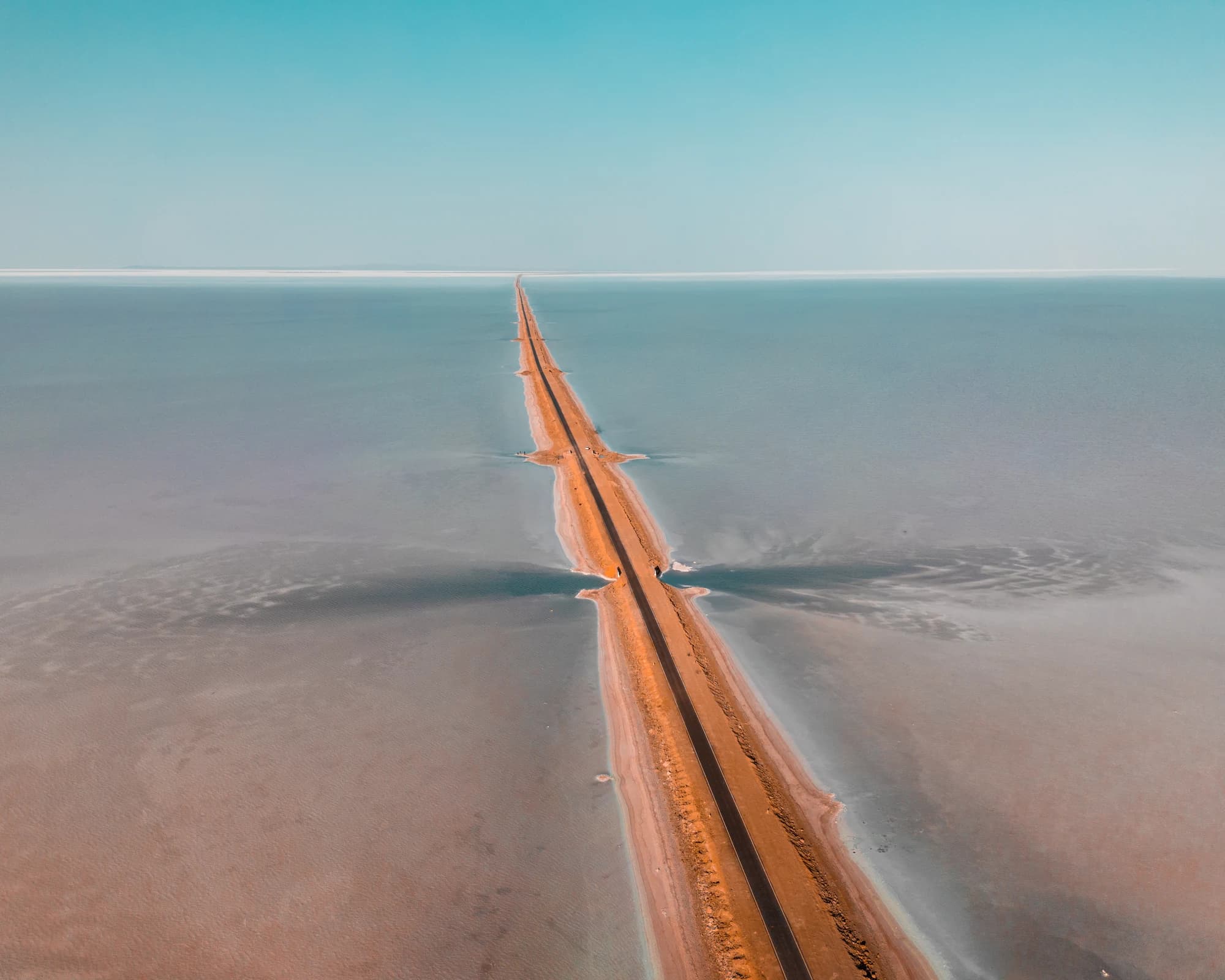 Road to Heaven in White Rann of Kutch — straight road through salt flats